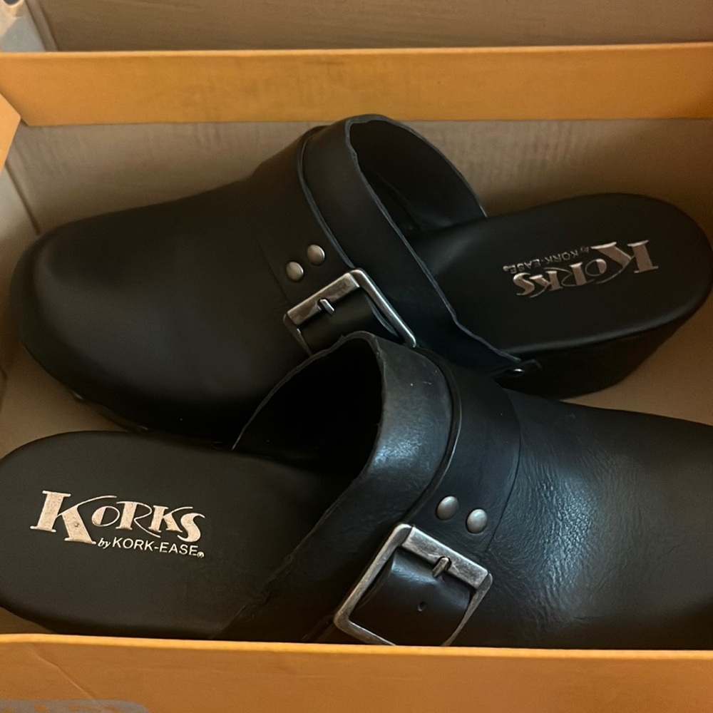Brand New Kork Ease clogs. Black buckle NWT size 9 .